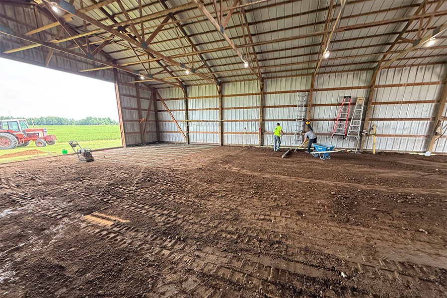 Class V material being graded and compacted in Oak Park, MN